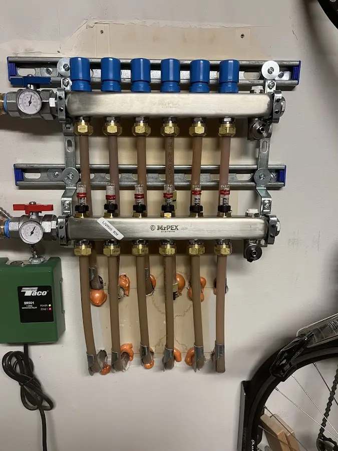 Plumber performing Leak Detection at a residential property in Pittsfield